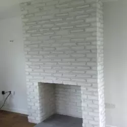 Vintage White Brick Corners fireplace wall